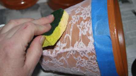 Sponge paint over the lace stockings in this easy craft for children.
